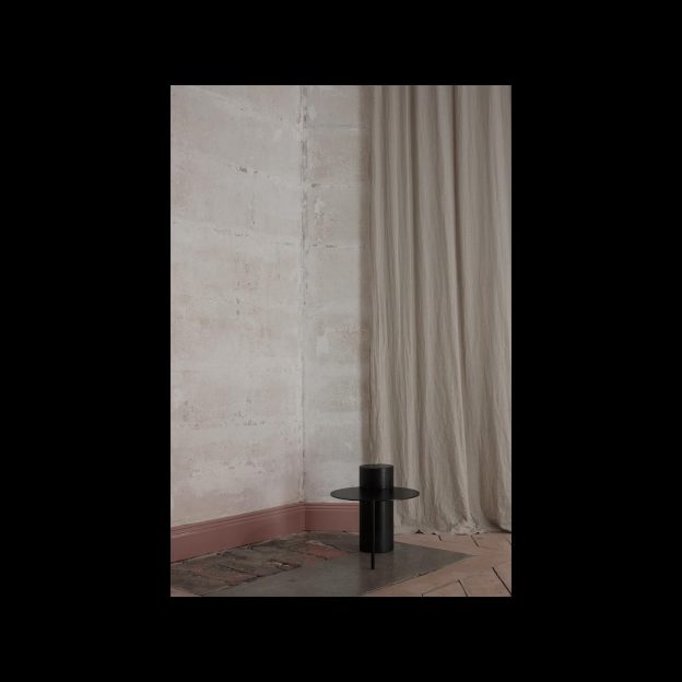 Artefact No 4 in our showroom.One solid pillar of stone, with a circle of steel thrust in it and supported with only one leg. This sprouted from the idea of creating an additional piece to the other tables in the collection, with as few parts as possible.Photo: Mathilda Werngren