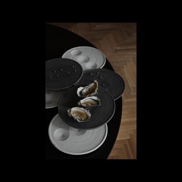Plate No 1, crafted for Alwares, elevates the art of serving. Designed to cradle oysters in an embrace of elegance, it transforms every meal into a celebration of the sea’s bounty, turning your table into a tableau of culinary delight.Photo: Mathilda Werngren Styling: Cecilia Tivar